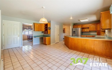 Set on .55 acres along the 16th hole of Olive Glenn Golf Course on Olive Glenn Golf and Country Club in Wyoming - for sale on GolfHomes.com, golf home, golf lot