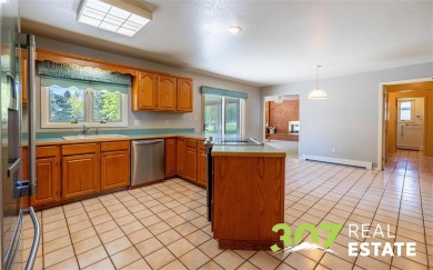 Set on .55 acres along the 16th hole of Olive Glenn Golf Course on Olive Glenn Golf and Country Club in Wyoming - for sale on GolfHomes.com, golf home, golf lot