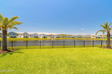 This exquisite Venetian Bay home offers a spacious lot on Venetian Bay Golf Course in Florida - for sale on GolfHomes.com, golf home, golf lot