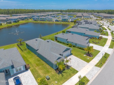 This exquisite Venetian Bay home offers a spacious lot on Venetian Bay Golf Course in Florida - for sale on GolfHomes.com, golf home, golf lot