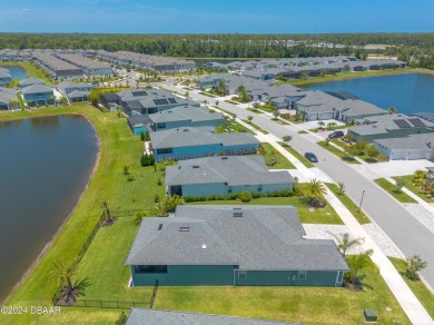 This exquisite Venetian Bay home offers a spacious lot on Venetian Bay Golf Course in Florida - for sale on GolfHomes.com, golf home, golf lot