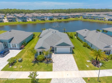 This exquisite Venetian Bay home offers a spacious lot on Venetian Bay Golf Course in Florida - for sale on GolfHomes.com, golf home, golf lot