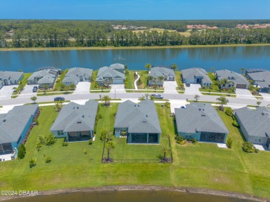 This exquisite Venetian Bay home offers a spacious lot on Venetian Bay Golf Course in Florida - for sale on GolfHomes.com, golf home, golf lot