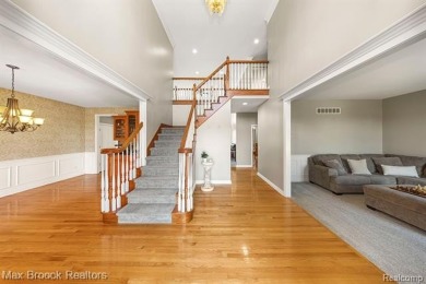 Welcome to this stunning colonial brick home in the highly on The Orchards Golf Club in Michigan - for sale on GolfHomes.com, golf home, golf lot