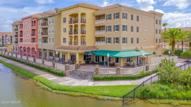 This exquisite Venetian Bay home offers a spacious lot on Venetian Bay Golf Course in Florida - for sale on GolfHomes.com, golf home, golf lot