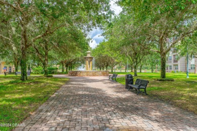 This exquisite Venetian Bay home offers a spacious lot on Venetian Bay Golf Course in Florida - for sale on GolfHomes.com, golf home, golf lot