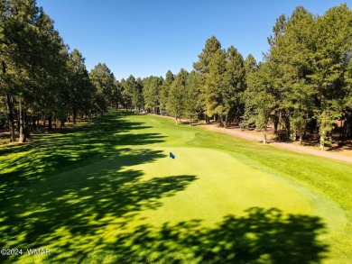 FAIRWAY and GREEN VIEWS! Experience the beauty of living right on Pinetop Lakes Golf and Country Club in Arizona - for sale on GolfHomes.com, golf home, golf lot