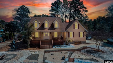 Don't miss out on this incredible canal-front home situated on on Duck Woods Country Club in North Carolina - for sale on GolfHomes.com, golf home, golf lot