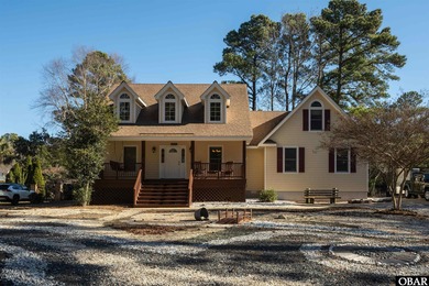 Don't miss out on this incredible canal-front home situated on on Duck Woods Country Club in North Carolina - for sale on GolfHomes.com, golf home, golf lot