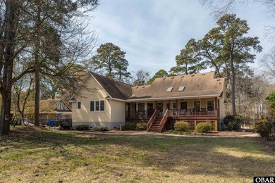 Don't miss out on this incredible canal-front home situated on on Duck Woods Country Club in North Carolina - for sale on GolfHomes.com, golf home, golf lot