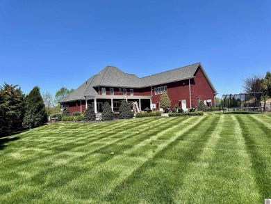 Located in the Grove Subdivision on a 1.72-acre lot, this on Country Club of Paducah in Kentucky - for sale on GolfHomes.com, golf home, golf lot