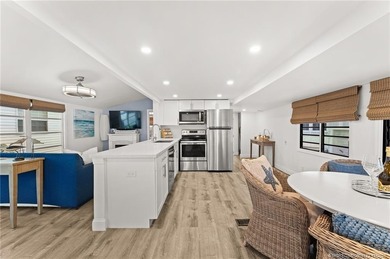 Charming and renovated is this 2 bedroom 1 bathroom getaway in on Island Dunes Country Club in Florida - for sale on GolfHomes.com, golf home, golf lot