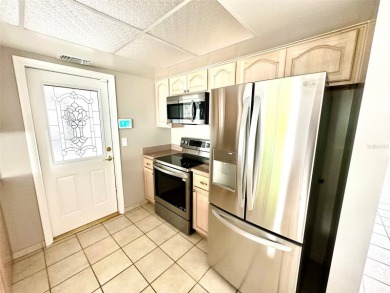 Wow!! Amazing home which has been remodeled beautifully in the on Mainlands Golf Club in Florida - for sale on GolfHomes.com, golf home, golf lot