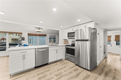 Charming and renovated is this 2 bedroom 1 bathroom getaway in on Island Dunes Country Club in Florida - for sale on GolfHomes.com, golf home, golf lot