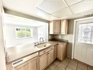 Wow!! Amazing home which has been remodeled beautifully in the on Mainlands Golf Club in Florida - for sale on GolfHomes.com, golf home, golf lot