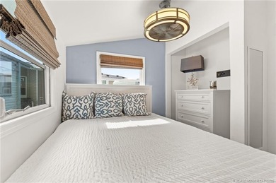 Charming and renovated is this 2 bedroom 1 bathroom getaway in on Island Dunes Country Club in Florida - for sale on GolfHomes.com, golf home, golf lot