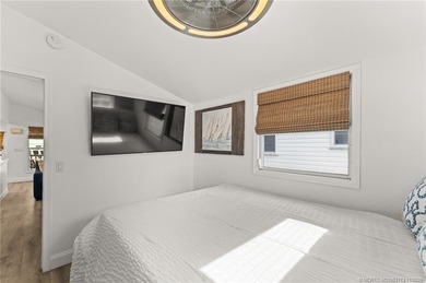 Charming and renovated is this 2 bedroom 1 bathroom getaway in on Island Dunes Country Club in Florida - for sale on GolfHomes.com, golf home, golf lot