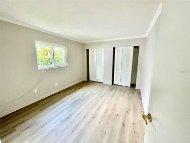 Wow!! Amazing home which has been remodeled beautifully in the on Mainlands Golf Club in Florida - for sale on GolfHomes.com, golf home, golf lot
