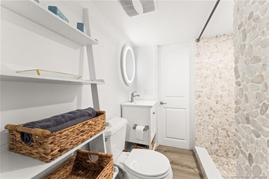 Charming and renovated is this 2 bedroom 1 bathroom getaway in on Island Dunes Country Club in Florida - for sale on GolfHomes.com, golf home, golf lot