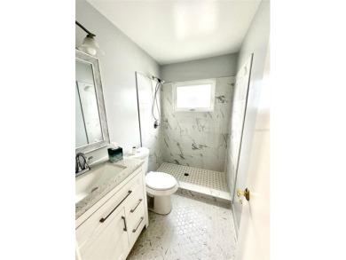 Wow!! Amazing home which has been remodeled beautifully in the on Mainlands Golf Club in Florida - for sale on GolfHomes.com, golf home, golf lot