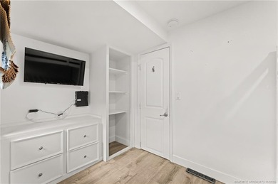 Charming and renovated is this 2 bedroom 1 bathroom getaway in on Island Dunes Country Club in Florida - for sale on GolfHomes.com, golf home, golf lot