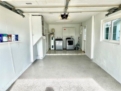 Wow!! Amazing home which has been remodeled beautifully in the on Mainlands Golf Club in Florida - for sale on GolfHomes.com, golf home, golf lot