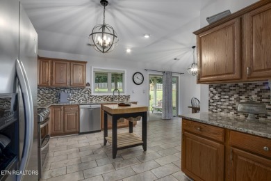 Welcome to this charming home in the heart of Tellico Village - on Tanasi Golf Course in Tennessee - for sale on GolfHomes.com, golf home, golf lot