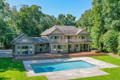 Nestled on 3 secluded acres, this stunning home embodies on Noyac Golf Club in New York - for sale on GolfHomes.com, golf home, golf lot