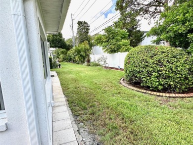 Wow!! Amazing home which has been remodeled beautifully in the on Mainlands Golf Club in Florida - for sale on GolfHomes.com, golf home, golf lot