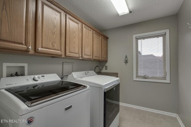 Welcome to this charming home in the heart of Tellico Village - on Tanasi Golf Course in Tennessee - for sale on GolfHomes.com, golf home, golf lot