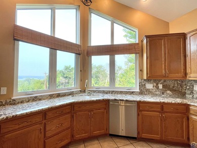 Lake living usually encourages boat, jet ski, golf cart, SXS on Lake Perry Country Club in Kansas - for sale on GolfHomes.com, golf home, golf lot