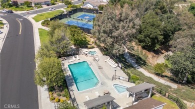 Are you looking to DOWNSIZE TO A SINGLE STORY home? This home is on Vista Valencia Golf Course in California - for sale on GolfHomes.com, golf home, golf lot