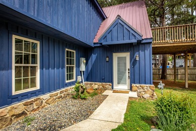 Brand New Exterior Paint completed April 2025! Adorable River on Riverland Country Club in Arkansas - for sale on GolfHomes.com, golf home, golf lot