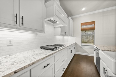 Classic architectural charm meets refined comfort in this on Carter Plantation Golf Course in Louisiana - for sale on GolfHomes.com, golf home, golf lot