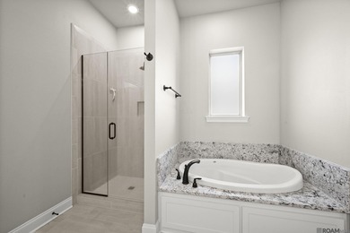 Classic architectural charm meets refined comfort in this on Carter Plantation Golf Course in Louisiana - for sale on GolfHomes.com, golf home, golf lot