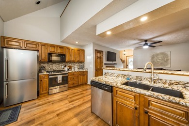 Brand New Exterior Paint completed April 2025! Adorable River on Riverland Country Club in Arkansas - for sale on GolfHomes.com, golf home, golf lot