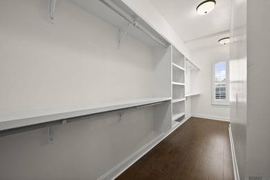 Classic architectural charm meets refined comfort in this on Carter Plantation Golf Course in Louisiana - for sale on GolfHomes.com, golf home, golf lot