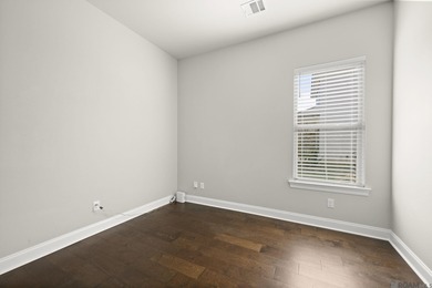 Classic architectural charm meets refined comfort in this on Carter Plantation Golf Course in Louisiana - for sale on GolfHomes.com, golf home, golf lot