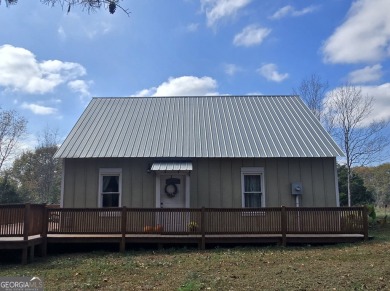 Charming 1-Bedroom Home with Loft on 1.71 Acres! Discover your on Highland Walk At Victoria Bryant in Georgia - for sale on GolfHomes.com, golf home, golf lot