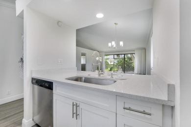 Located in the highly desirable Club Cottages within PGA on PGA National Golf Club in Florida - for sale on GolfHomes.com, golf home, golf lot