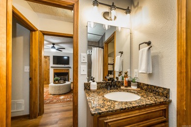 Brand New Exterior Paint completed April 2025! Adorable River on Riverland Country Club in Arkansas - for sale on GolfHomes.com, golf home, golf lot