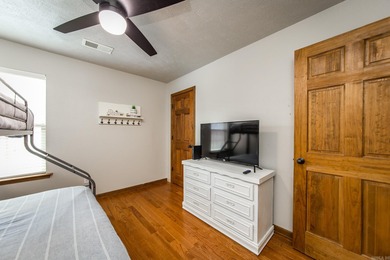 Brand New Exterior Paint completed April 2025! Adorable River on Riverland Country Club in Arkansas - for sale on GolfHomes.com, golf home, golf lot