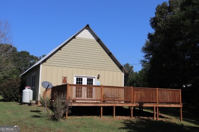 Charming 1-Bedroom Home with Loft on 1.71 Acres! Discover your on Highland Walk At Victoria Bryant in Georgia - for sale on GolfHomes.com, golf home, golf lot