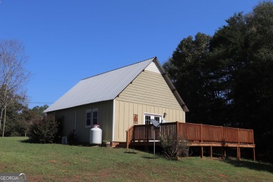 Charming 1-Bedroom Home with Loft on 1.71 Acres! Discover your on Highland Walk At Victoria Bryant in Georgia - for sale on GolfHomes.com, golf home, golf lot