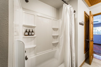 Brand New Exterior Paint completed April 2025! Adorable River on Riverland Country Club in Arkansas - for sale on GolfHomes.com, golf home, golf lot