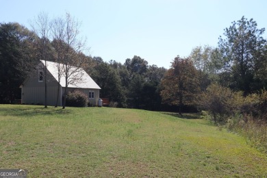 Charming 1-Bedroom Home with Loft on 1.71 Acres! Discover your on Highland Walk At Victoria Bryant in Georgia - for sale on GolfHomes.com, golf home, golf lot