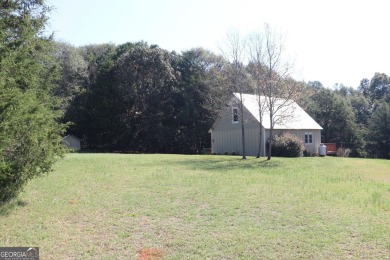 Charming 1-Bedroom Home with Loft on 1.71 Acres! Discover your on Highland Walk At Victoria Bryant in Georgia - for sale on GolfHomes.com, golf home, golf lot