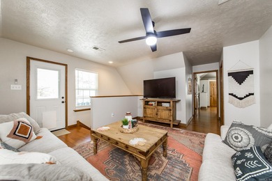 Brand New Exterior Paint completed April 2025! Adorable River on Riverland Country Club in Arkansas - for sale on GolfHomes.com, golf home, golf lot