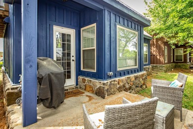 Brand New Exterior Paint completed April 2025! Adorable River on Riverland Country Club in Arkansas - for sale on GolfHomes.com, golf home, golf lot