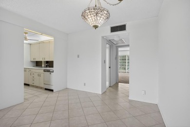Needs some TLC for this nice Unit in Wynmoor Golf Village where on Wynmoor Golf Course in Florida - for sale on GolfHomes.com, golf home, golf lot